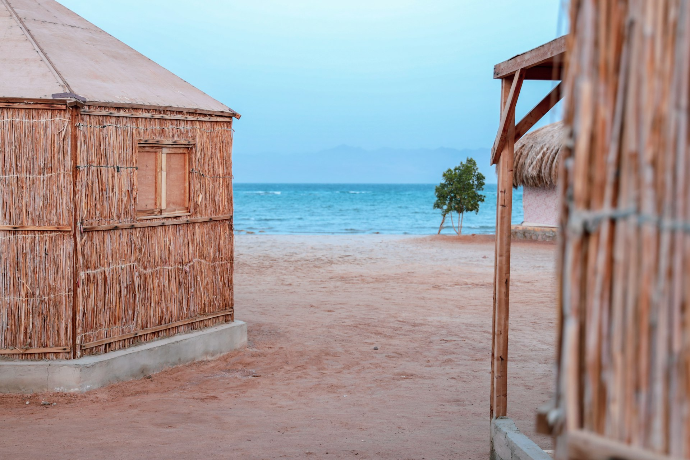 Beach huts beside the sea in South Sin